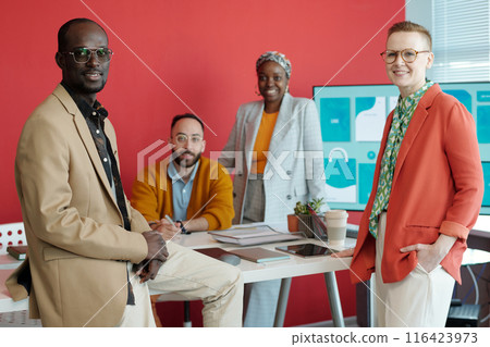 Diverse Team in Modern Office with Digital Presentation Diverse Team in Modern Office with Digital Presentation 116423973