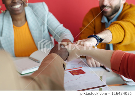 Multi-Ethnic Business Team Bumping Their Fists on Office Meeting Multi-Ethnic Business Team Bumping Their Fists on Office Meeting 116424055