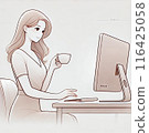 A woman working on a computer while drinking coffee in a cafe 116425058