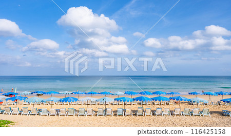 Beach in summer season at Phuket Thailand. Concept Travel and tour background,Empty beach copy space with waves crashing on sand Beach in summer season at Phuket Thailand. Concept Travel and tour background,Empty beach copy space with waves crashing on sand 116425158
