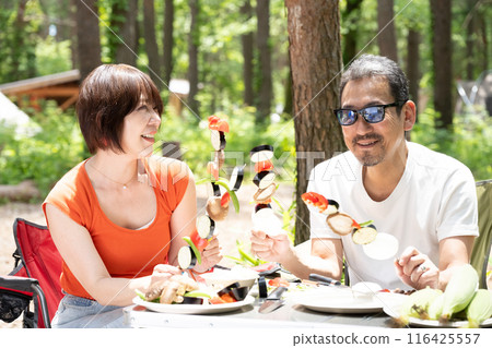 Senior couple having fun at outdoor camping 116425557