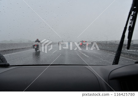 Guerrilla downpour: Heavy rain so heavy you can't see ahead on the highway Guerrilla downpour: Heavy rain so heavy you can't see ahead on the highway 116425780