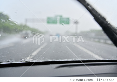 Guerrilla downpour: Heavy rain so heavy you can't see ahead on the highway Guerrilla downpour: Heavy rain so heavy you can't see ahead on the highway 116425782