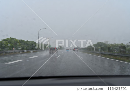 Guerrilla downpour: Heavy rain so heavy you can't see ahead on the highway Guerrilla downpour: Heavy rain so heavy you can't see ahead on the highway 116425791