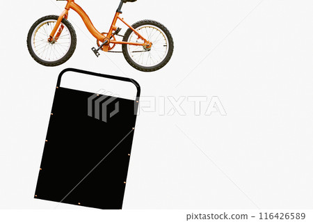 Orange bicycle, black board for inscription, information on white 116426589