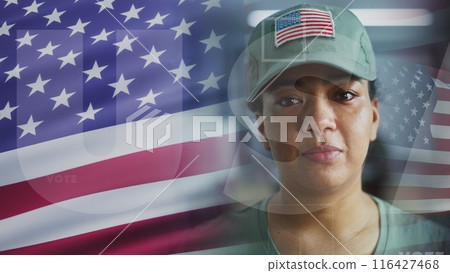American female soldier and 3D animation of waving US flag American female soldier and 3D animation of waving US flag 116427468
