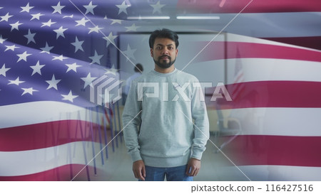 Indian US citizen looks at camera. 3D graphics of waving American flag 116427516