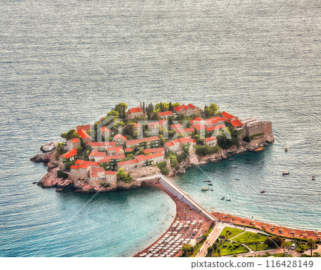 Captivating sunset view of Adriatic coast and islet Sveti Stefan from church st. Sava viewpoint near Budwa 116428149