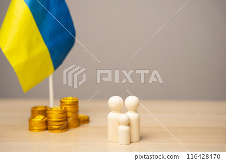 The concept of helping Ukrainian residents affected by the war. Financial support and donation. Economy, finance and fund. Family figures near the Ukrainian flag with coins 116428470