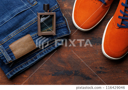 Men's Clothing on wooden Background 116429046
