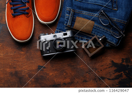Men's Clothing on wooden Background 116429047