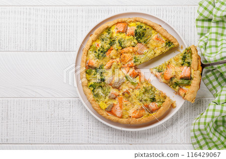 Homemade pie with salmon and broccoli Homemade pie with salmon and broccoli 116429067