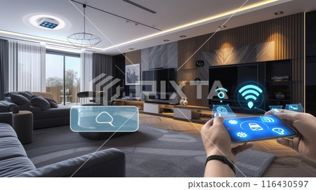 Hand holding a smartphone with a smart home control interface in a well-designed modern living room. 116430597