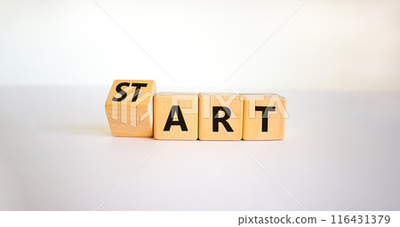 Start art symbol. Turned the cube and changed the word 'start' to 'art'. Beautiful white table, white background. Business and start art concept, copy space. Start art symbol. Turned the cube and changed the word 'start' to 'art'. Beautiful white table, white background. Business and start art concept, copy space. 116431379