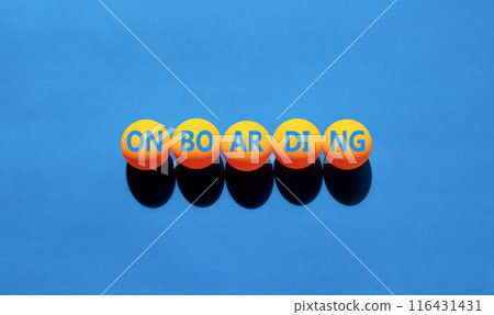 Onboarding success symbol. Concept word Onboarding on yellow ping pong balls. Beautiful blue background. Business onboarding success concept. Copy space. Onboarding success symbol. Concept word Onboarding on yellow ping pong balls. Beautiful blue background. Business onboarding success concept. Copy space. 116431431