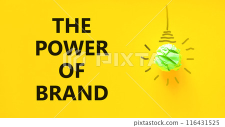 The power of brand symbol. Concept words The power of brand on beautiful yellow paper. Beautiful yellow background. Green light bulb icon. Business the power of brand concept. Copy space. 116431525