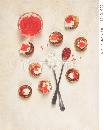Demidoff pancakes, mini pancakes, with sour cream and red caviar, crepes. homemade, no people, 116431602