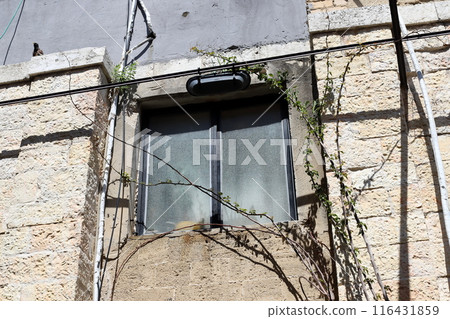 Small window as architectural housing construction in Israel. Small window as architectural housing construction in Israel. 116431859
