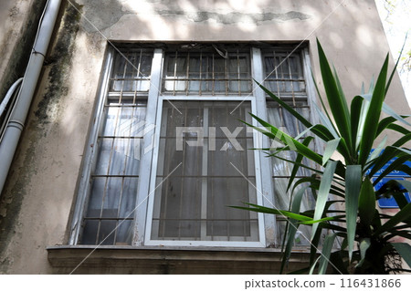 Small window as architectural housing construction in Israel. 116431866