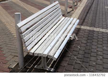 Rest bench in a city park in Israel. Rest bench in a city park in Israel. 116432702