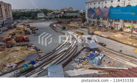 Repair works on the street timelapse. Laying of new tram rails on a city street 116433338