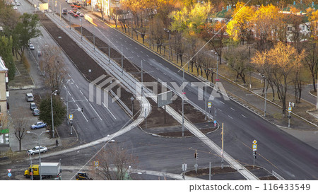 Construction site of avenue with road traffic aerial timelapse. 116433549