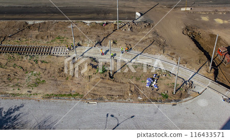Workers install new tram rails during a reconstruction of the route timelapse. 116433571