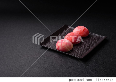 Delicious colorful asian mochi sweets with rice dough shell 116433642