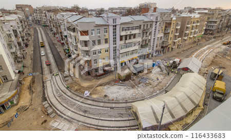 Concrete works for road maintenance construction site with many workers and mixer timelapse 116433683