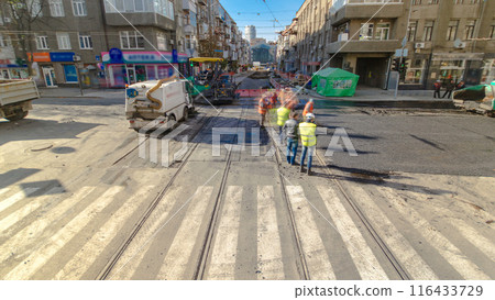 Tractor, roller on the road repair site timelapse. Road construction equipment. 116433729