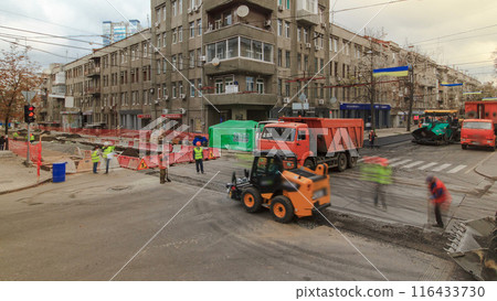 Tractor, roller on the road repair site timelapse. Road construction equipment. 116433730