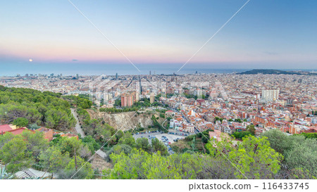 View of Barcelona day to night timelapse, the Mediterranean sea, The tower Agbar and The twin towers from Bunkers Carmel. Catalonia, Spain. View of Barcelona day to night timelapse, the Mediterranean sea, The tower Agbar and The twin towers from Bunkers Carmel. Catalonia, Spain. 116433745