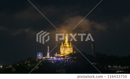 Temple of the Sacred Heart of Jesus timelapse on Tibidabo Mountain in Barcelona in clouds, Catalonia, Spain 116433750