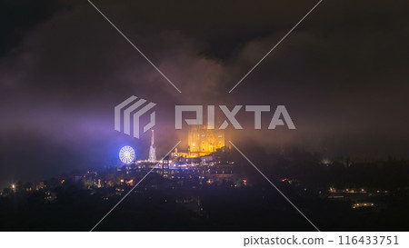 Temple of the Sacred Heart of Jesus timelapse on Tibidabo Mountain in Barcelona in clouds, Catalonia, Spain 116433751