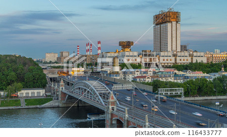 Evening view at the Russian Academy of Sciences day to night timelapse and Novoandreevsky Bridge over the Moscow River. 116433777