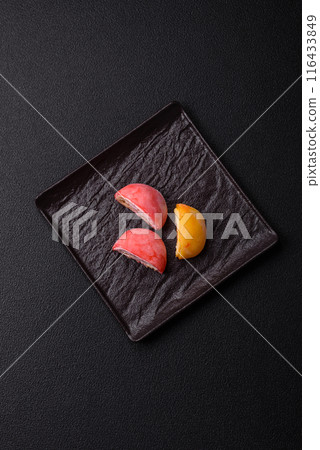 Delicious colorful asian mochi sweets with rice dough shell 116433849
