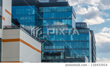 Windows in office buildings in Tverskaya Zastava near Temple of St. Nicholas timelapse in Moscow, Russia 116433914