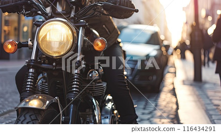 Motorcyclist navigates urban traffic, leaving a trail of excitement in their wake. 116434291