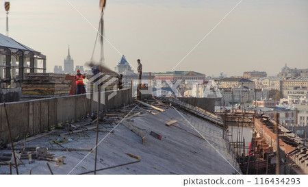 Steel bar rebar metal framework reinforcement for concrete at construction site timelapse. 116434293