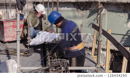 Steel bar rebar metal framework reinforcement for concrete at construction site timelapse. Steel bar rebar metal framework reinforcement for concrete at construction site timelapse. 116434295
