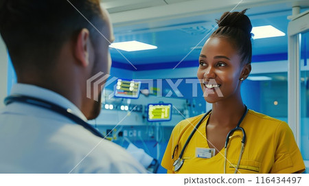 A moment of camaraderie as hospital staff recharge with some lighthearted banter. Team spirit at its best! 116434497