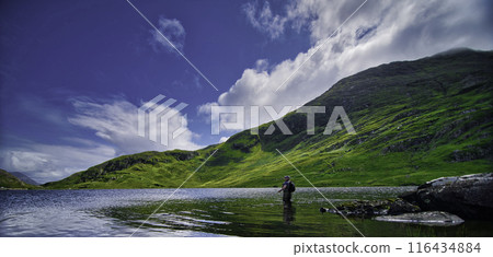fly fishing man on the lake, and boat, cloudu blu sky fly fishing man on the lake, and boat, cloudu blu sky 116434884
