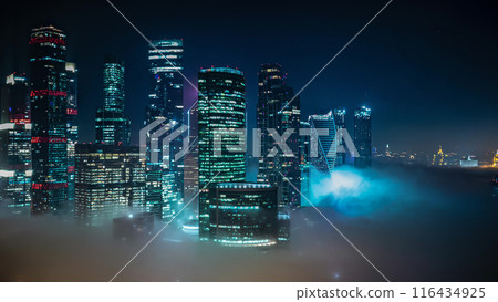 Moscow City business center skyscrapers office buildings and luxury apartments night fog timelapse. 116434925