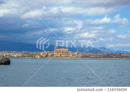 Panoramic view of Palma de Mallorca with cathedral from the harbor with storm clouds Panoramic view of Palma de Mallorca with cathedral from the harbor with storm clouds 116436094