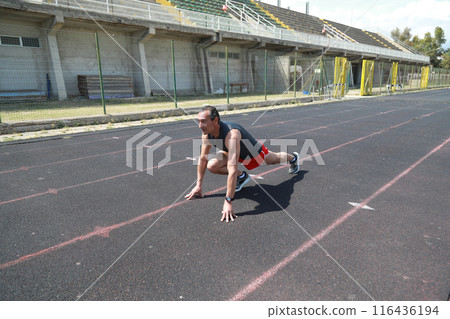 The Body Of A Professional Runner Stretching The Body Of A Professional Runner Stretching 116436194