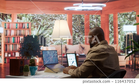 Entrepreneur communicates sales activity numbers to the investors on videocall, creating an analysis to obtain more funds. Business owner making a presentation pitch for development plans. Camera B. 116437052