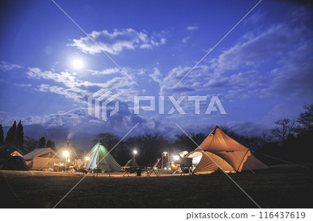 Camping scenery on a moonlit night Camping scenery on a moonlit night 116437619