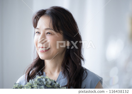 A beautiful smiling woman in her 50s - A profile image of beauty and beauty A beautiful smiling woman in her 50s - A profile image of beauty and beauty 116438132