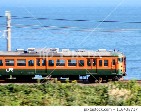 Kosei Line 113 series train passing Lake Biwa 116438717