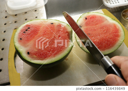 I cut the first watermelon from my home garden. I cut the first watermelon from my home garden. 116439849